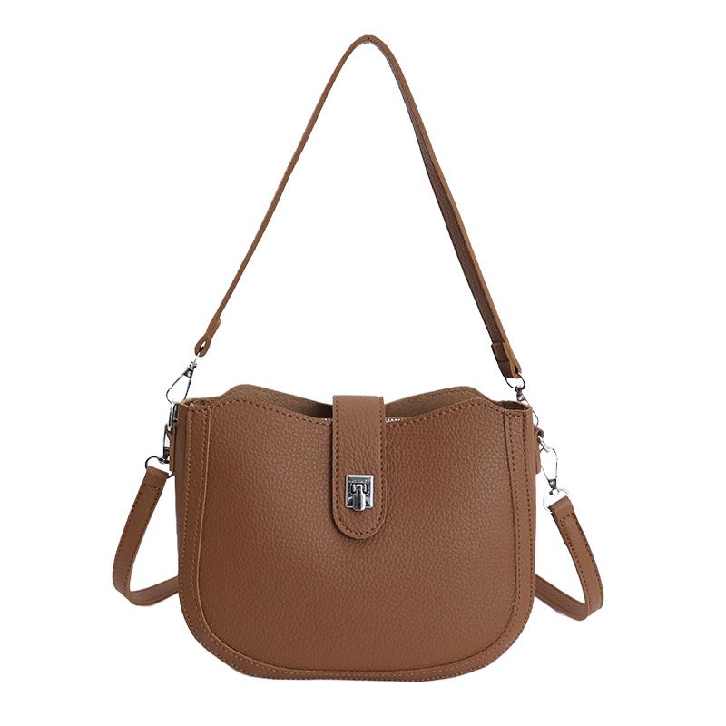Hot sale nuevo nicho coreano litchi estampado bolso de cubo de hombro para mujeres sensación de lujo ligero versátil bolso de transporte de viaje