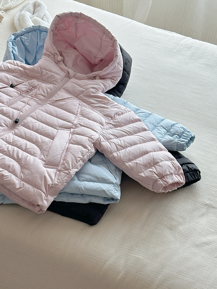 2025 chaqueta de plumón de niñas nueva ropa de invierno no flúor fuerte impermeable con capuchón para niños 90 chaqueta de goma blanca