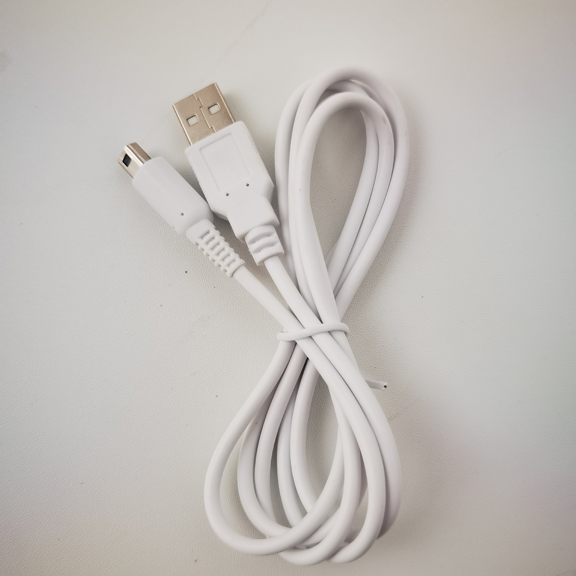 Adecuado para cable de carga de Nintendo 3DS/3DSXL, blanco NDSI de cobre puro de 1.2m, con certificación CE, éxito de ventas transfronterizo.