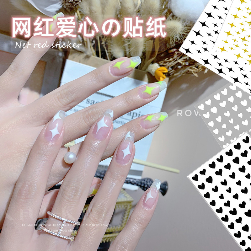 En línea de la celebridad de uñas amor pegatinas estrella Oro hueco pequeño fresco adhesivo en forma de corazón calcomanías de uñas decoraciones duraderas