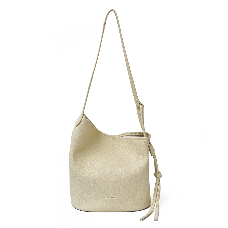Bolso de cubo de textura transfronteriza 2025 verano nuevo bolso femenino estilo ins bolso de hombro simple