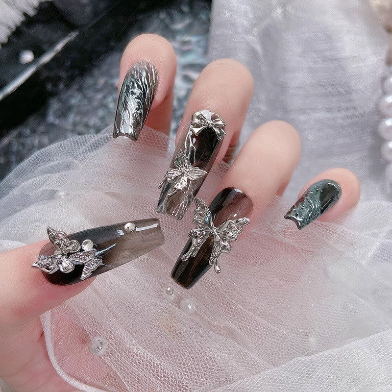 2023 Internet Celebrity nueva aleación de uñas joyería vintage blanco K serie aleación mariposa joyería accesorios de aleación