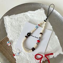 手作りのインスタ映えする黒い小花ビーズのリストチェーン、可愛いコントラストカラーの携帯電話ストラップ、CCDカメラストラップ、トレンド