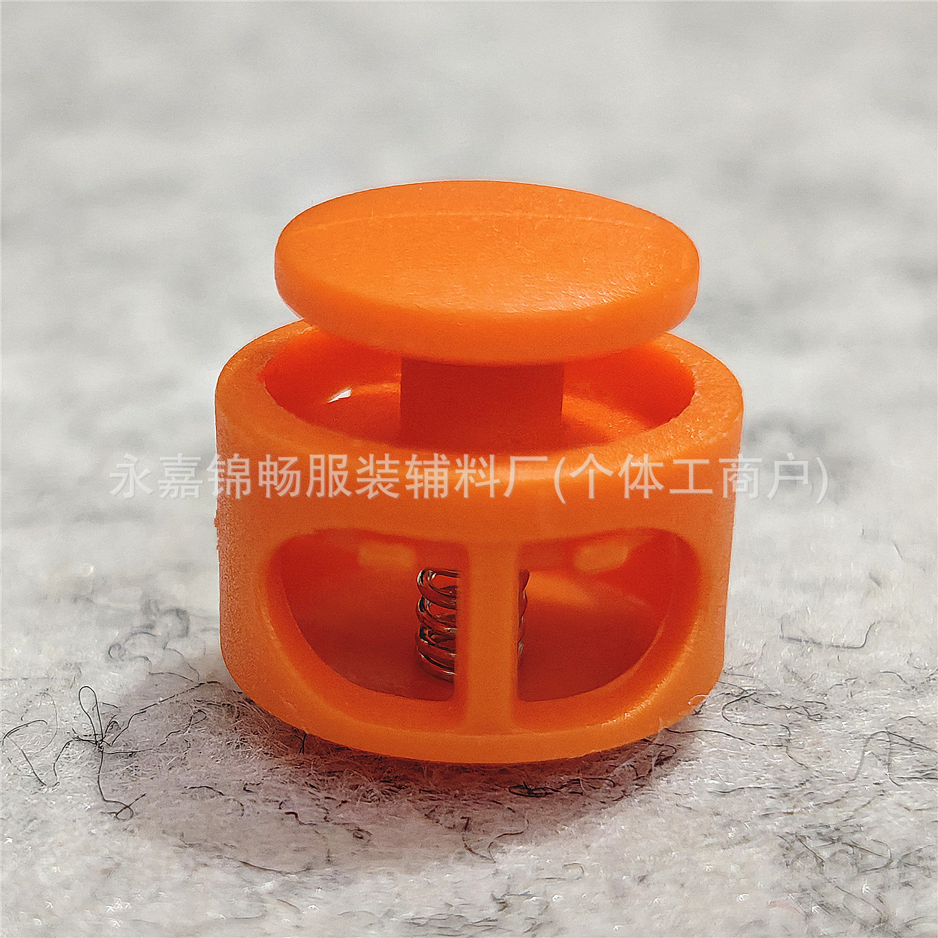 Botón de resorte de color botón de nariz de cerdo de doble agujero de plástico ajustable botón de pan antideslizante cilíndrico botón de cuerda de campana colgante de color sólido