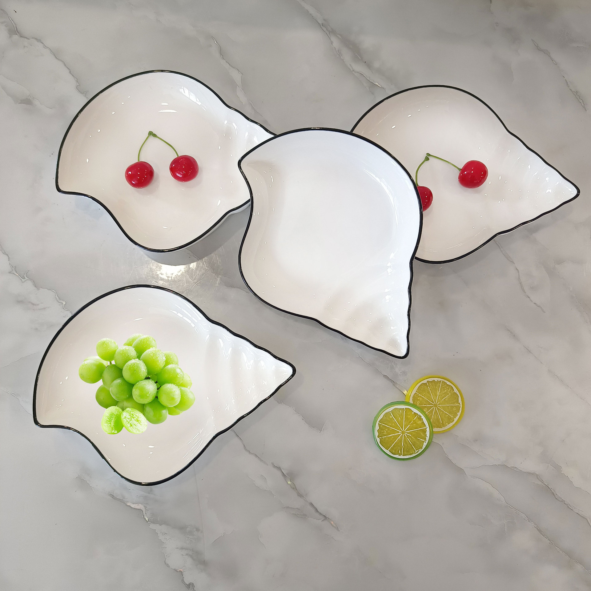 日式简约家用釉下彩陶瓷创意网红盘陶瓷ins风海螺盘不规则水果盘