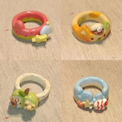 漫画の子供の趣味のカラーの小さい猫の青い黄色は星の小さい魚の指輪を配色します。
