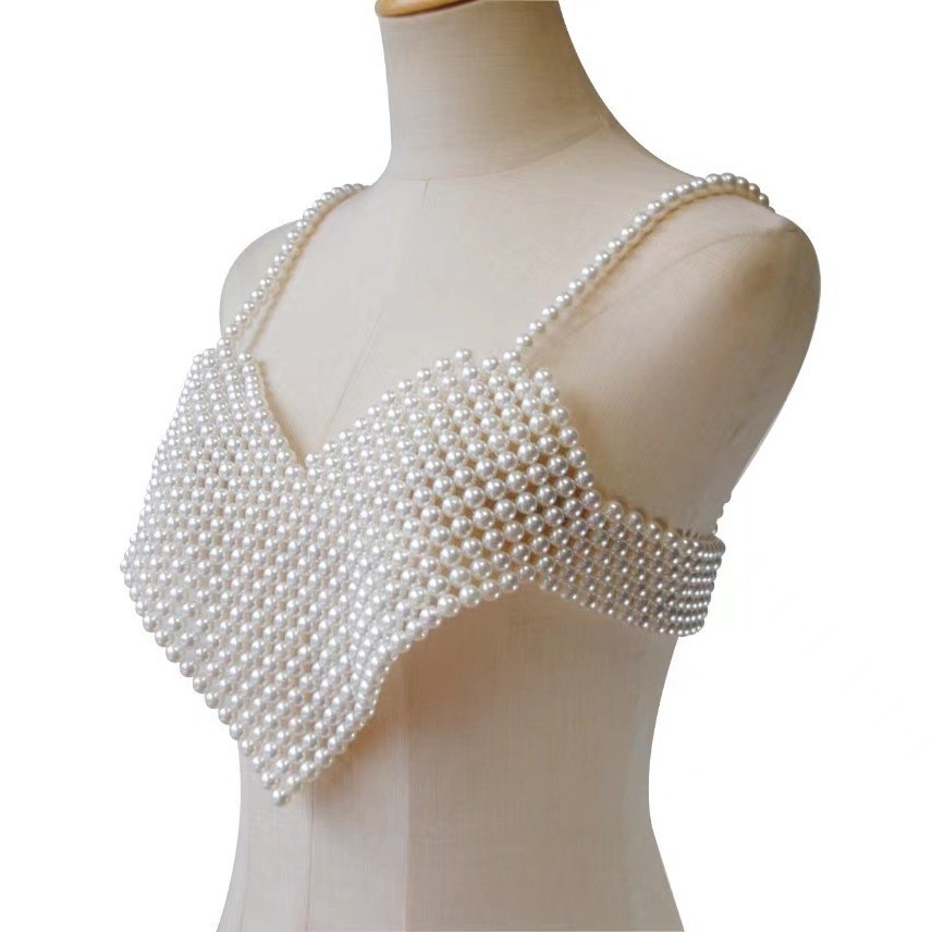 Joyas transfronterizas europeas y americanas cadena de cuerpo de perlas hueca creativa moda sexy chal de perlas borla cadena de pecho de alta calidad