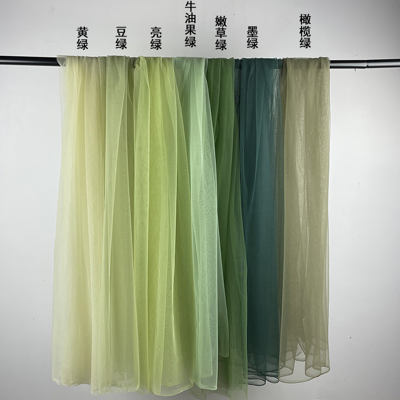 Wedding background gauze avocado green soft encryption mesh Chinese clothing fabric grass green transparent wedding dress fabric