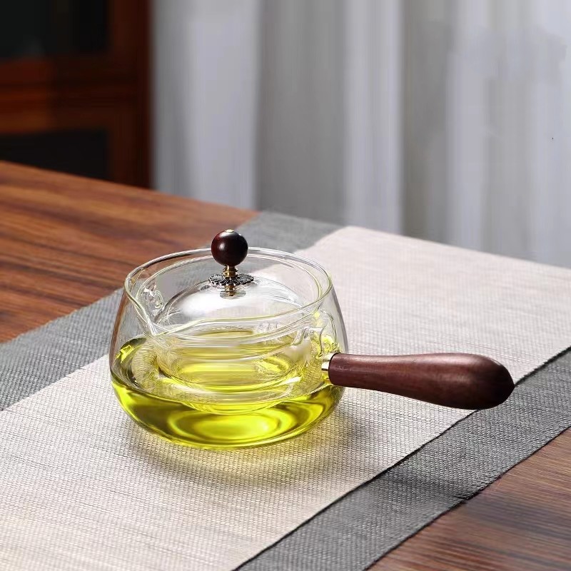 Mango de madera lateral de vidrio de borosilicato olla de ocio 360 ° revestimiento giratorio fabricante de té hogar estufa de cerámica eléctrica tetera