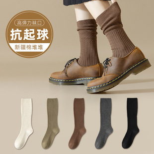 Socks women's autumn and winter smoking piled socks new solid color net red stockings spring and autumn comfortable high elastic socks wholesale