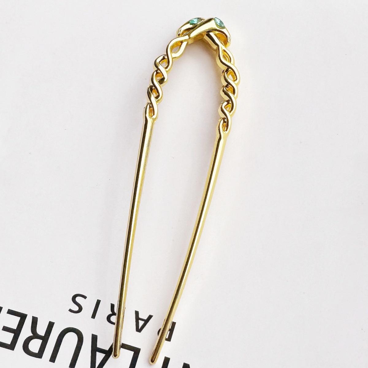 Europa y América clásica sensación de lujo ligero metal en forma de U clip de cabello de tendencia serpentina clip de cabello de torsión diamantes accesorios clip de cabello