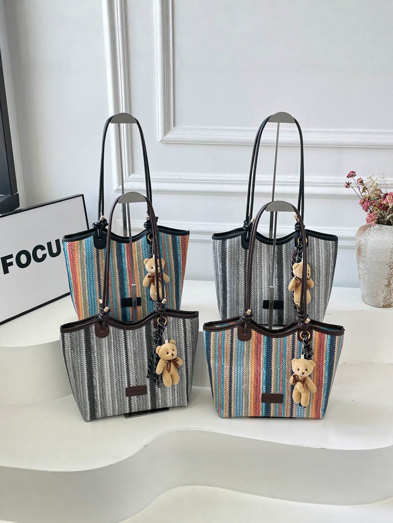 2026 nueva bolsa de tejido para mujeres de gran capacidad de viaje bolso de hombro portátil a rayas de moda bolso de mochila