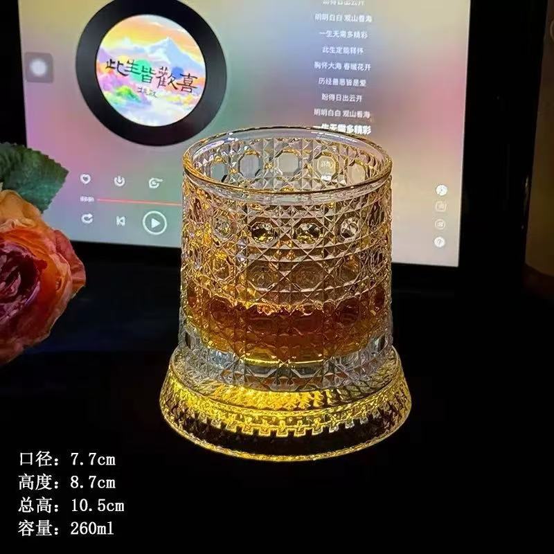 Vaso de whisky de alto valor con base explosivo vaso de vidrio luminoso giratorio tumbler vaso de cerveza giratorio vaso de agua