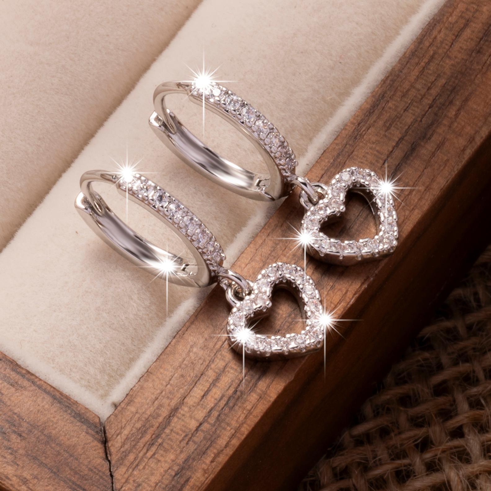 fashionable brand earrings with zircon