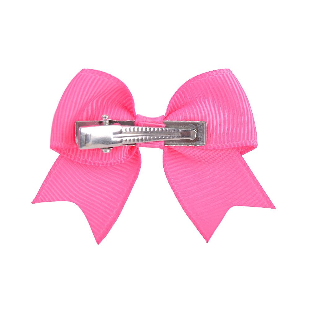 Nihaojewelry Simple Pure Color Children's Bow Hairpin Wholesale Jewelry display picture 3