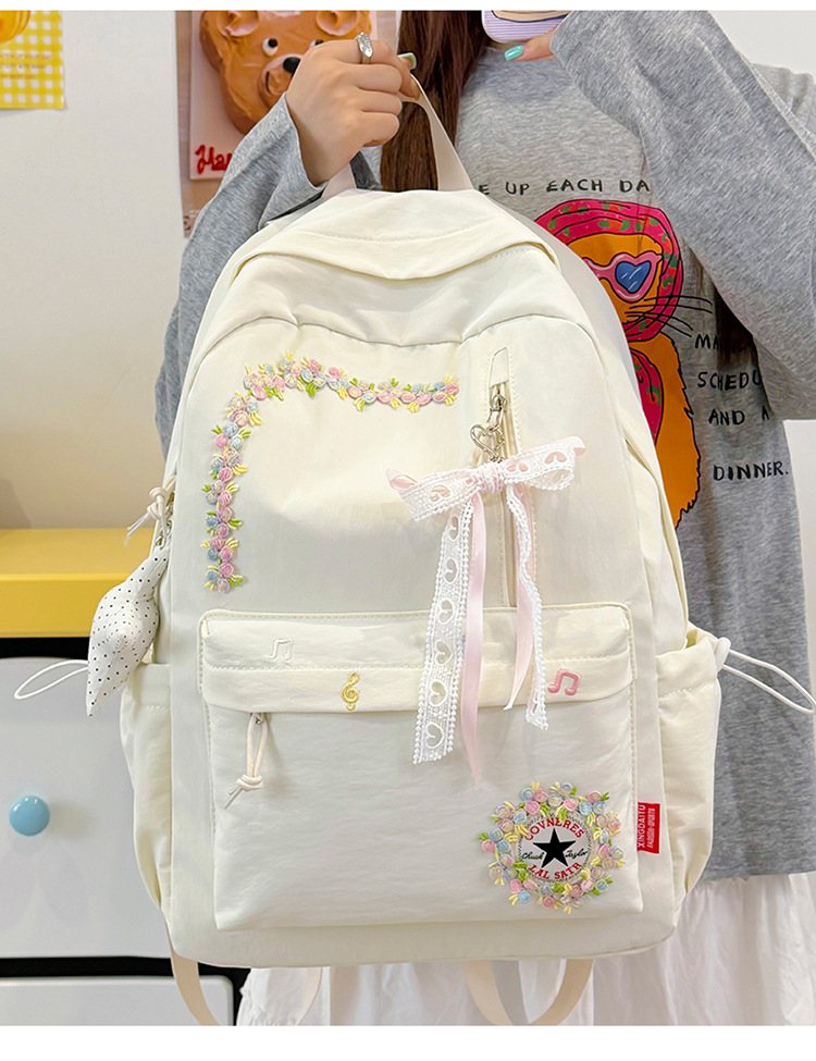 Neue grenzüberschreitende Freizeit-Trend-Rucksack mit Blumenmuster hochwertige leichte Schultasche großes Fassungsvermögen beliebter Campus-Rucksack