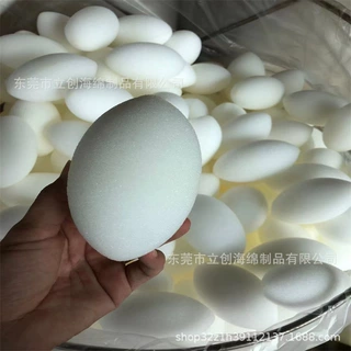 高回弹橄榄球异形海绵球鸡蛋魔术超大海绵球20CM沙滩包布海棉
