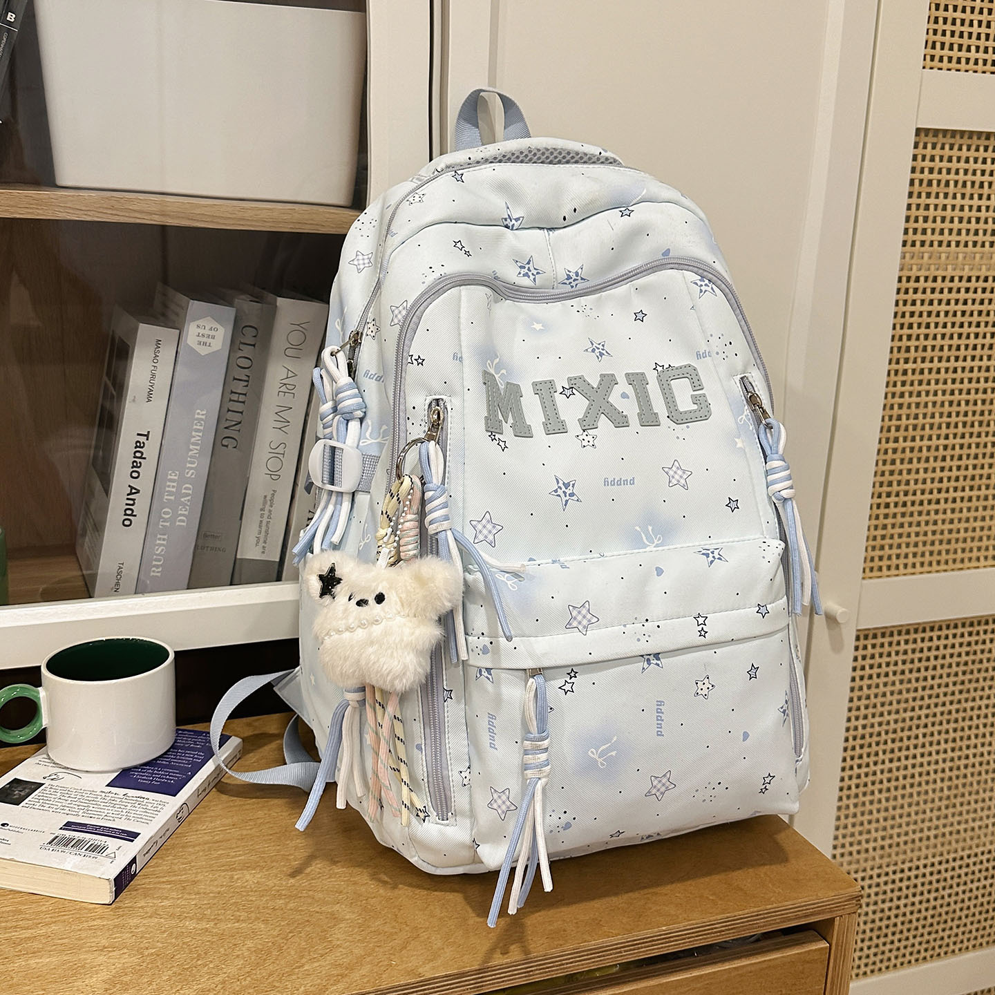 Blue double shoulder strap black star white fur rabbit charm