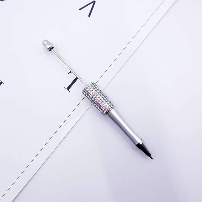 Bolígrafo giratorio de grano lindo de color degradado de tendencia de alto valor Bolígrafo de gomas galvanizado con cuentas de diamantes de bricolaje creativo