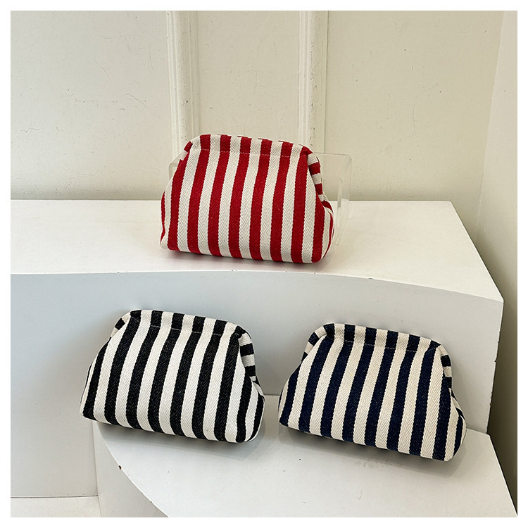 New cross-border fashion color-blocking striped cosmetic bag, women's loose change mobile phone storage bag, trendy and niche cloud clutch undefined