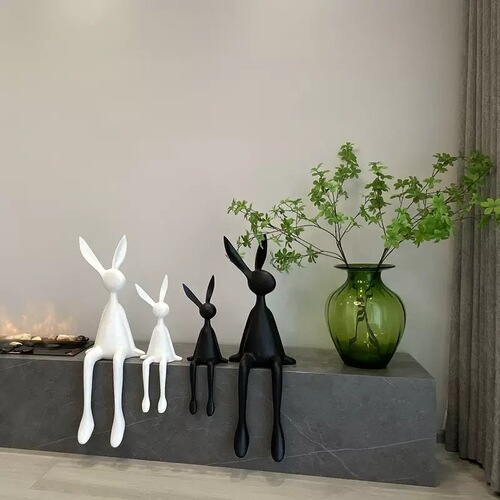 Minimalist modern black and white long ear rabbit figurine, cute rabbit sitting posture sculpture, living room TV cabinet home decoration item
