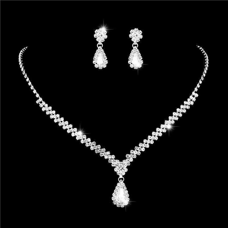 新商品のアクセサリーの卸売金属のダイヤモンドのネックレスのイヤリングの2つのセットの結婚式の花嫁のアクセサリーのセットの組み合わせ|undefined