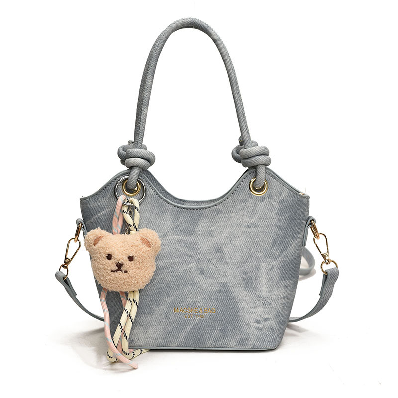 Corea del Sur ins moda bolso de cubo de mano 2025 nuevo estilo simple ocio versátil bolso de hombro textura superior