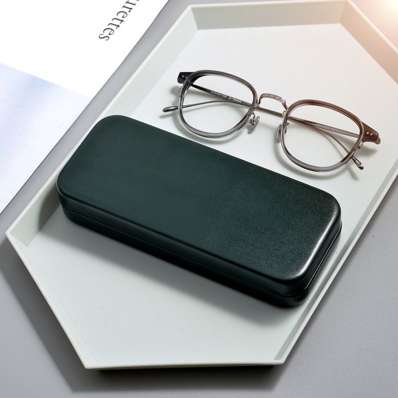Caja de gafas simple para hombres y mujeres estilo retrógrado estilo portátil anti-presión viaje miopía gafas caja de cáscara