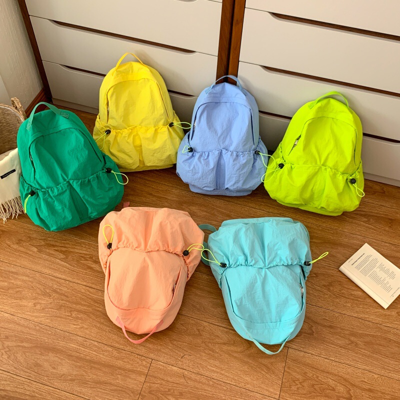 Nylon backpack, lightweight, large capacity, drawstring, pleated, water-resistant, dopamine-style student schoolbag, commuter travel backpack