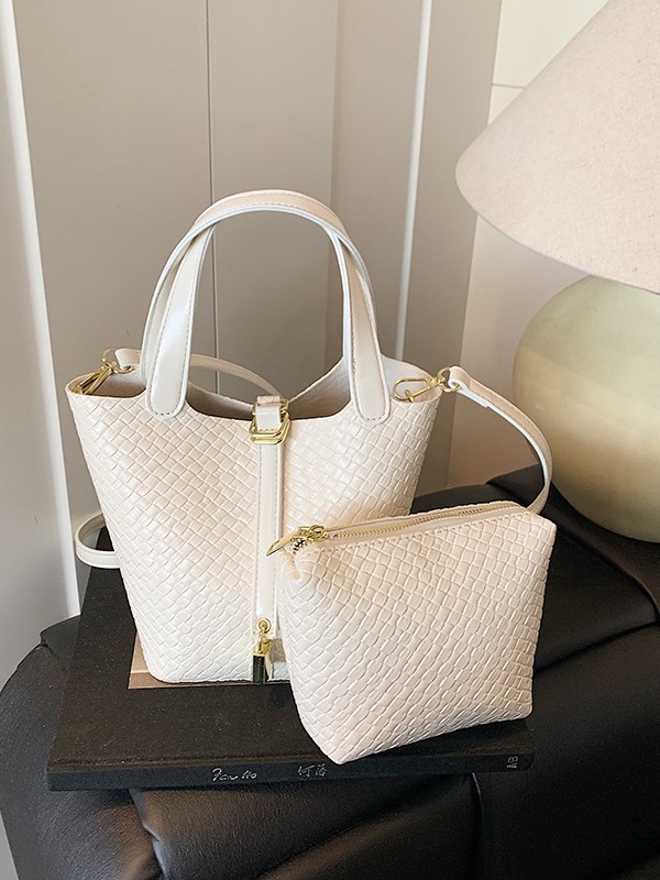 Bolso de cubo portátil con patrón tejido para mujer 2025 nuevo estilo coreano de lujo ligero de alta gama bolso de mensajero para niños de nicho