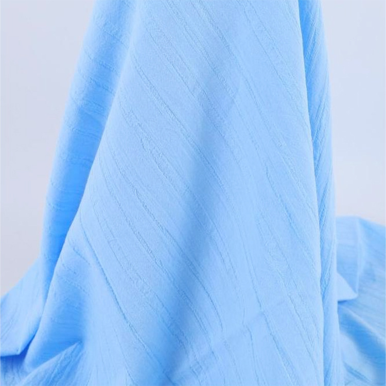 Nueva promoción de tejido suave 100% algodón jacquard tela camisa de mujer vestido