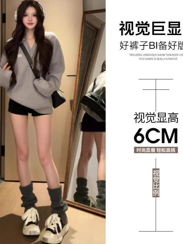 黒いギャルの半ズボンの女性の春と秋の冬は腰が高くて痩せています。