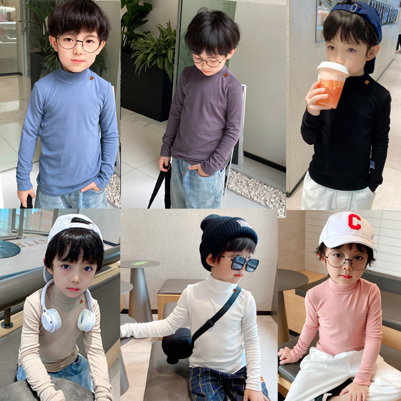 Ropa de otoño e invierno para niños nuevo estilo coreano color sólido camiseta de los muchachos medio cuello alto camisa de fondo para niñas engrosada bebé manga larga superior