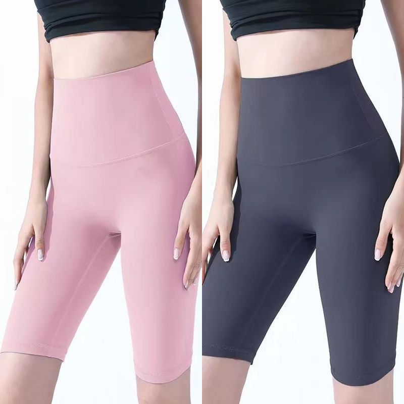 Pantalones cortos desnudos de mujer elásticos apretados para elevar las caderas de cinco puntos pantalones deportivos de secado rápido succión de sudor entrenamiento para correr fábrica de comercio de ping