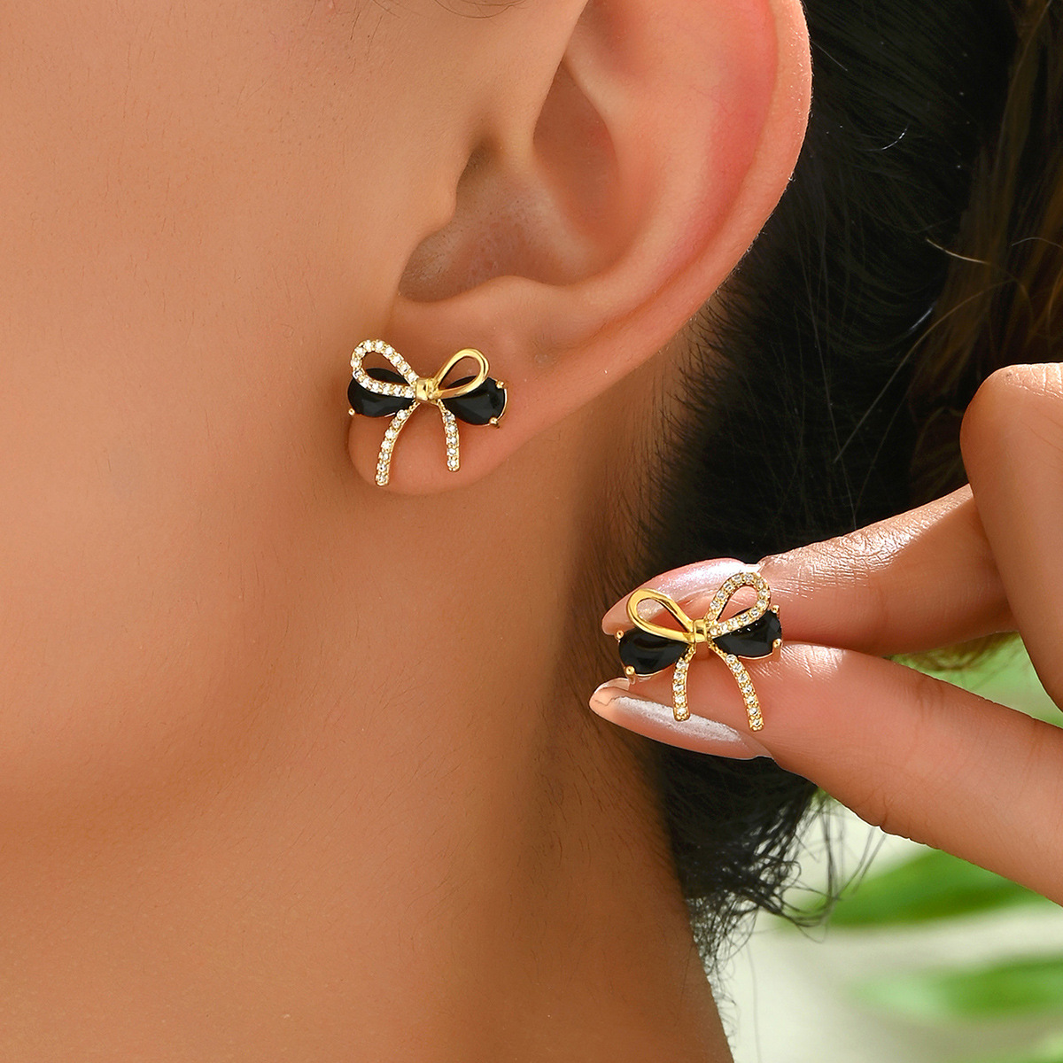 Brand design earrings with bow