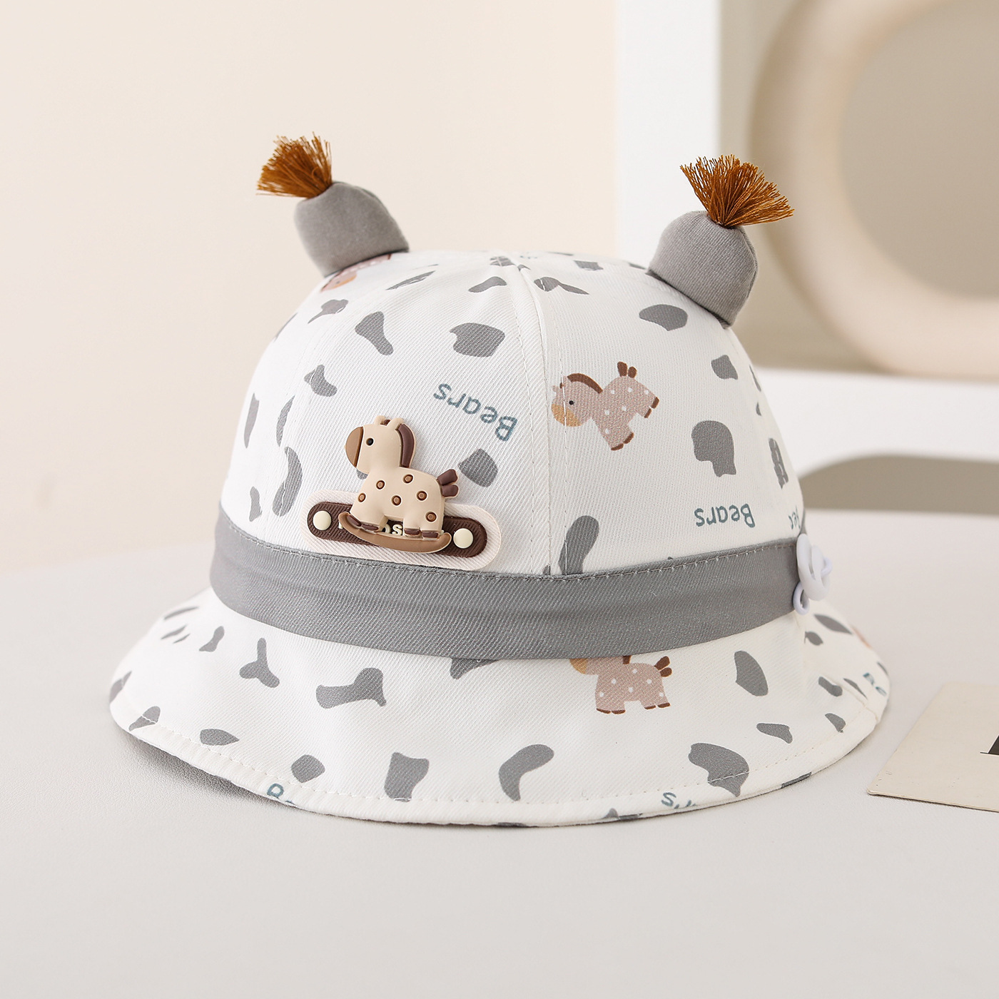 Cappello da sole per bambini a secchiello con pony per l'estate_voghion.com