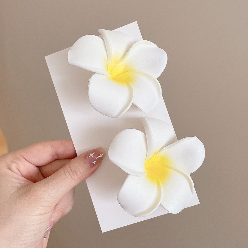 Huevo flor clip lateral clip lateral de alta calidad mujer 2025 nuevo tocado de cabello de flores de playa clip de flores de tamaño grande