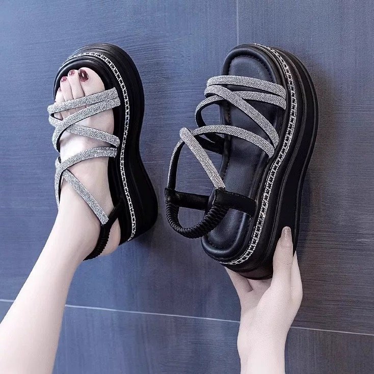 Sandalias de diamante de moda para mujeres 2026 verano nuevo elástico de fondo grueso aumento de altura versátil sandalias de muffin romana
