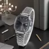 Women's silver shell black surface