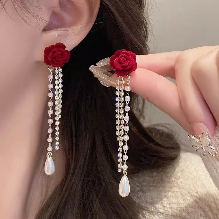 S925 aguja de plata elegante pendientes de nicho femenino diseño de gama alta pendientes populares pendientes de perlas pendientes únicos al por mayor