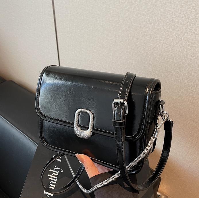 Textura salvaje popular super fuego pequeño bolso cuadrado 2025 nuevo bolso femenino simple viajero casual estilo occidental bolso de mensajero de un solo hombro