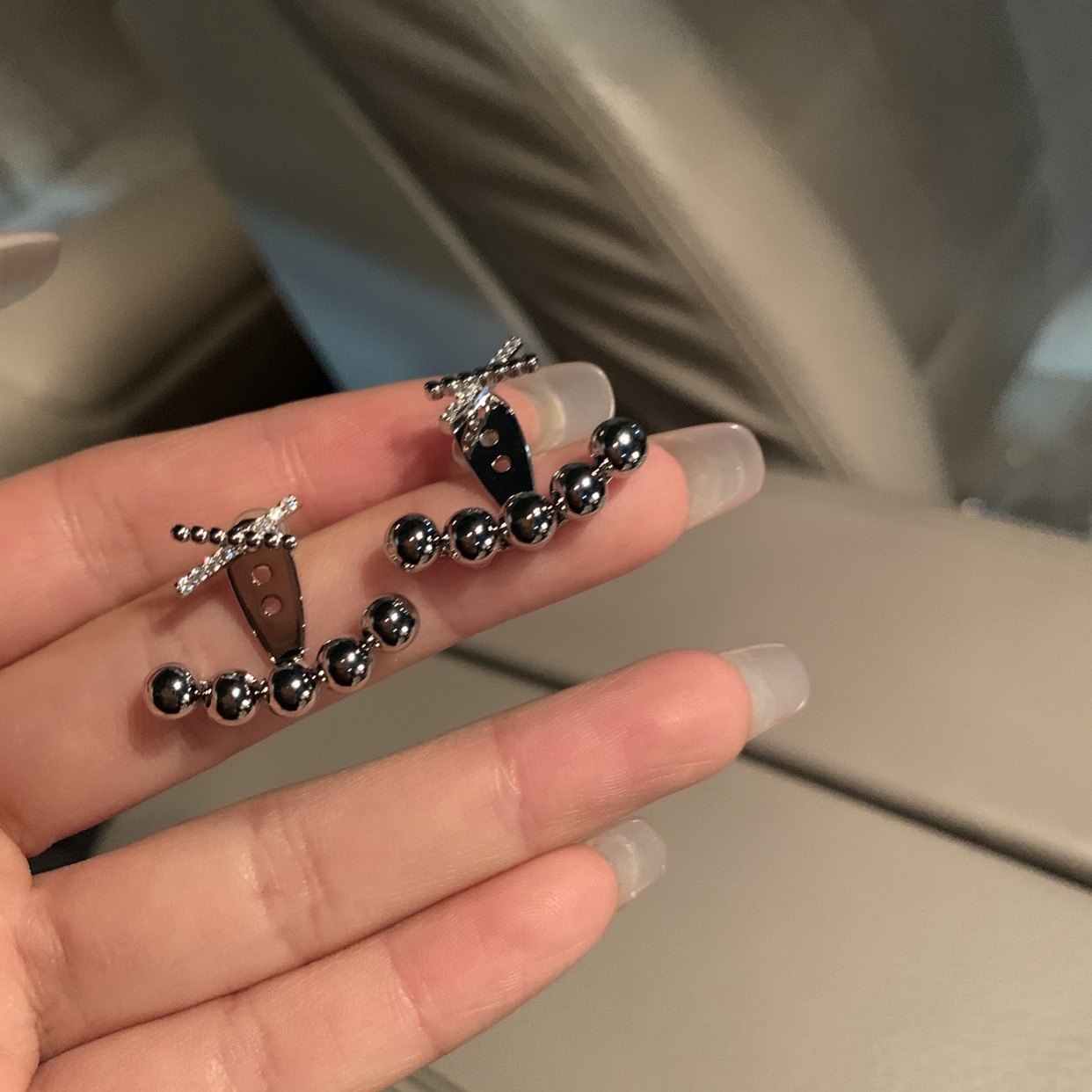 Cross hanging style simple and fashionable women's metal round bean personalized light luxury earrings, earrings_voghion.com