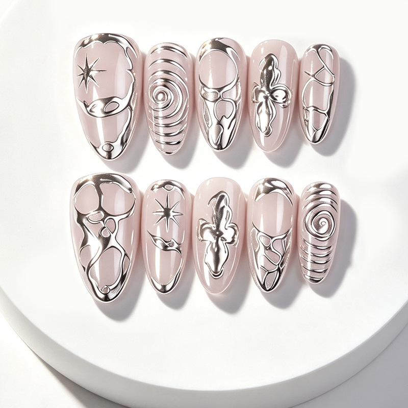 Nude pink silver gilded embossed cat-eye press-on nails Y2K abstract liquid metal style spiral almond-shaped nail tips wholesale Nude pink silver gilded embossed cat-eye press-on nails Y2K abstract liquid metal style spiral almond-shaped nail tips wholesale