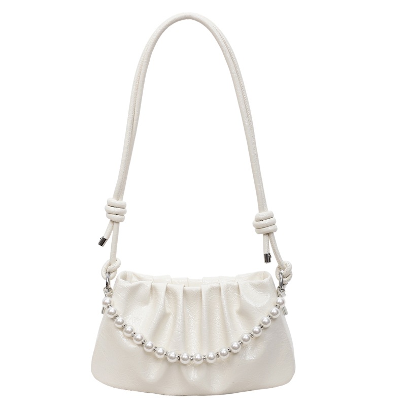 Bolsa de nube plegable de comercio exterior para mujeres 2025 nueva bolsa de brazo de aire extranjero versátil alta sensación de mochila de viaje