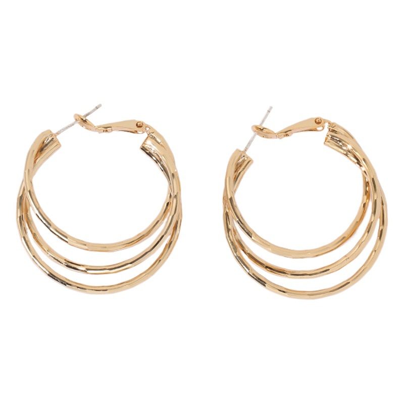 Latón chapado 18K oro real moda ins elegante europeo y americano versátil círculo laminado línea pendientes moda femenina