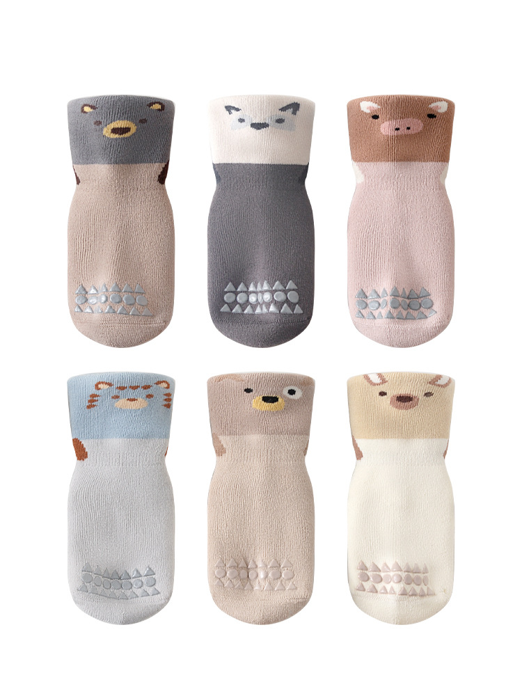 Calcetines del piso de los niños de invierno Nuevo engrosamiento Terry cálido recién nacido niños y niñas media pantorrilla antideslizante calcetines de bebé