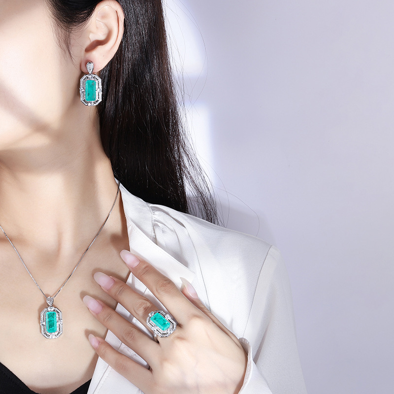 Zhuang Sheng joyería de cobre chapado en oro real simulación Paraiba anillo collar traje creativo completo diamante con incrustaciones 8*16