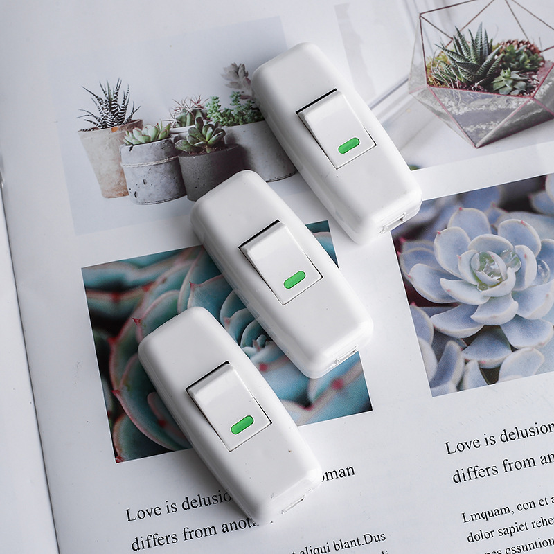 Xinda Thai bedside switch pure white small rocker power wiring switch double outlet hole multi-purpose button switch Xinda Thai bedside switch pure white small rocker power wiring switch double outlet hole multi-purpose button switch
