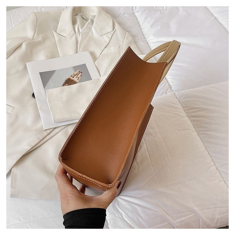 2024 New Bags Korean Version Versatile Commuting Bags Large Capacity Portable Tote Bag Temperament Popular Women’s Bag Vertical Style_voghion.com