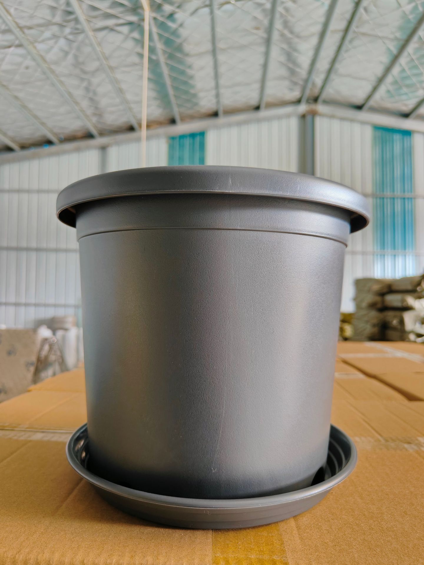 dark gray [recycling material] tray